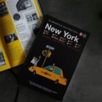 a book with a picture of a taxi cab